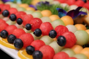 Graduation party catering gourmet fruit kebobs